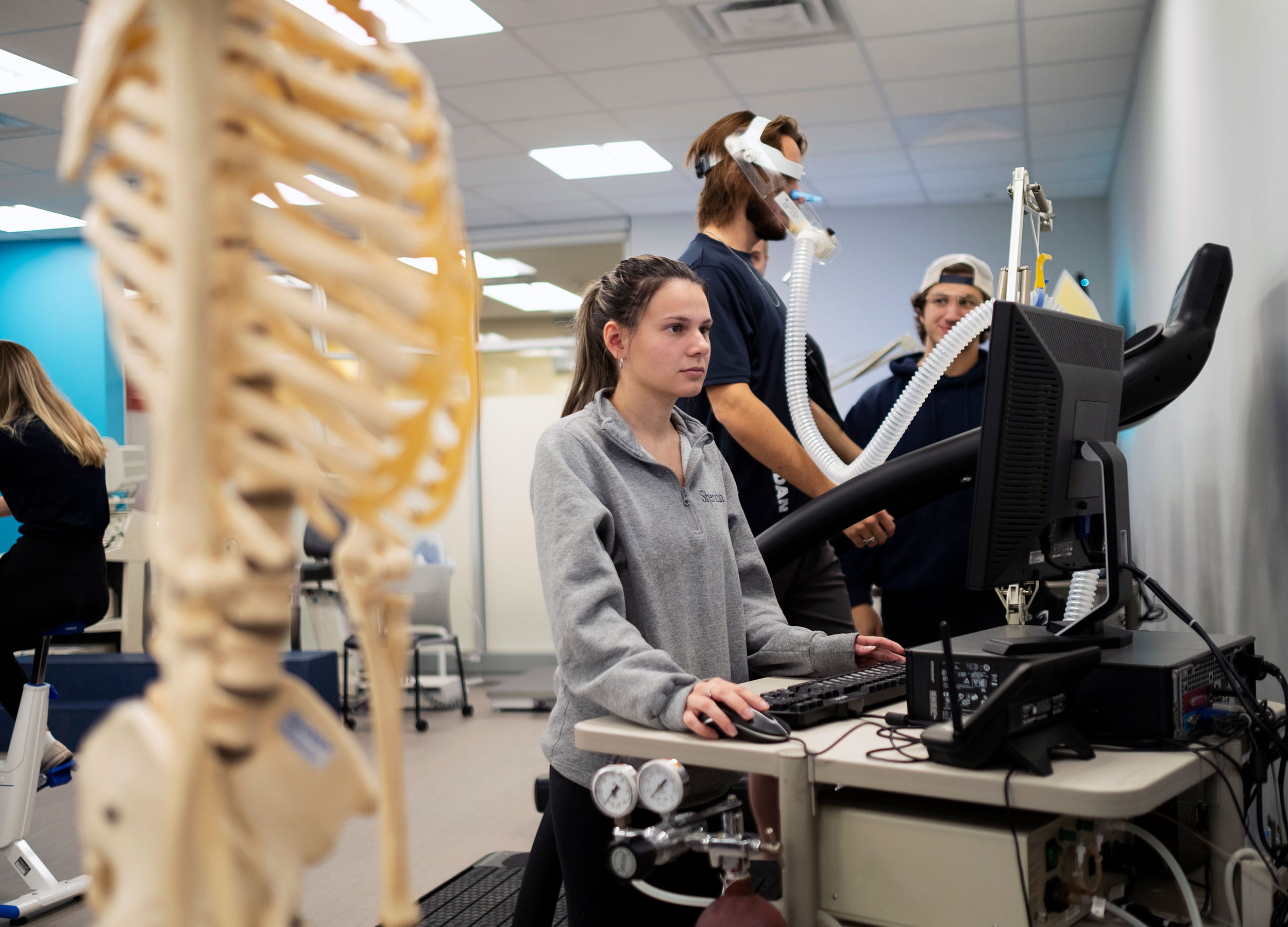 Students working in a kinesiology clinic